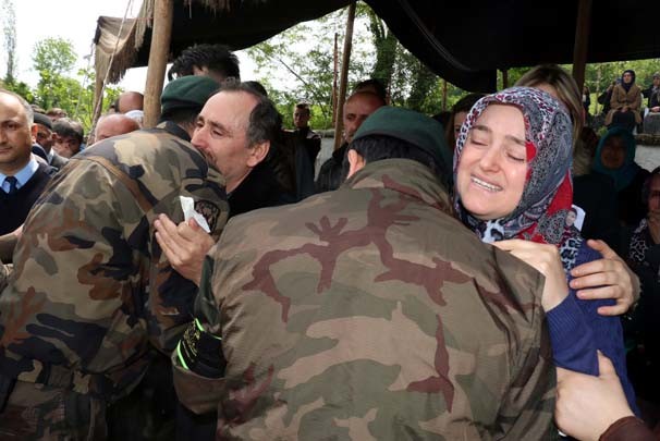 Özel harekat polisinin koluna yazdığı ayet 2