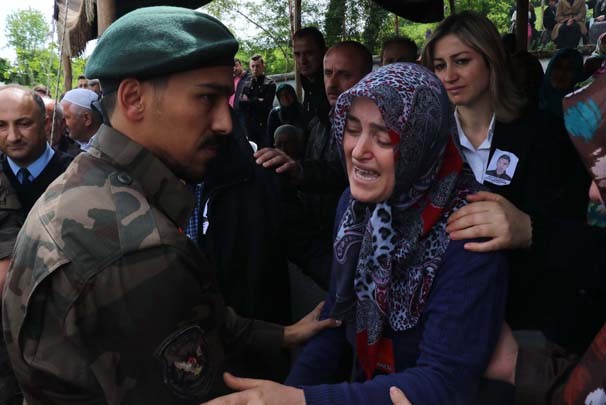 Özel harekat polisinin koluna yazdığı ayet 5