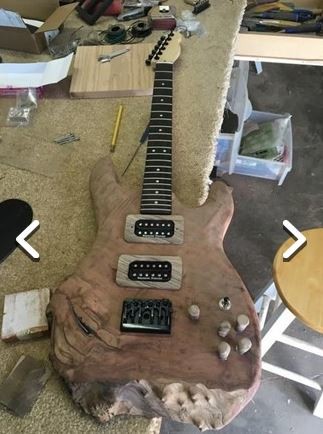 Tahta parçasından gitar yaptı 14