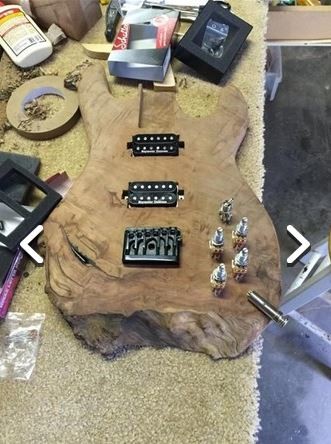 Tahta parçasından gitar yaptı 15