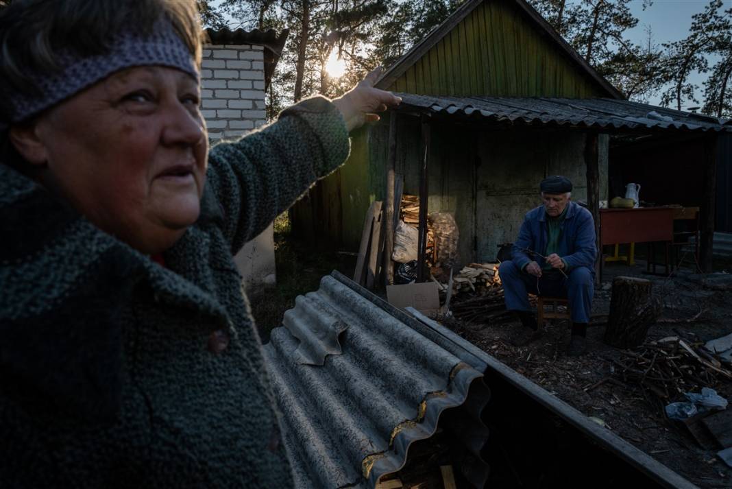 Rus güçlerinden geri alınan bölgelerde savaşın izleri: Gömülen cesetler kimlik tespiti için çıkarılıyor 3