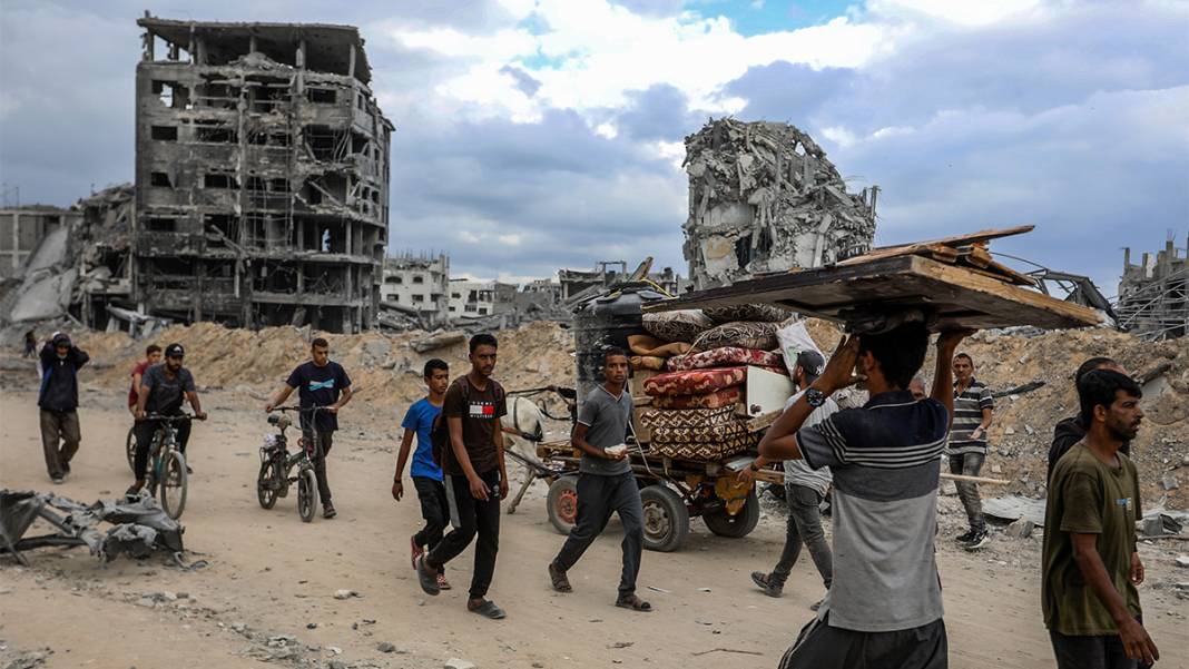 Dönüş yolları yıkımla dolu: Filistinlilerin sevinci, enkaz altında kaldı 4