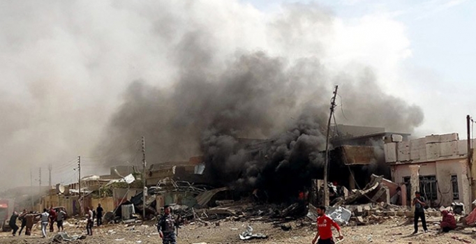 Irak'ta düzenlenen intihar saldırılarında 82 kişi öldü