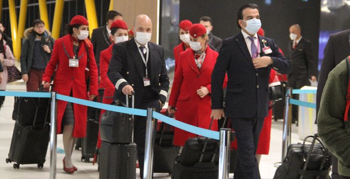 THY ekipleri Çin uçuşlarında maske takmaya başladı