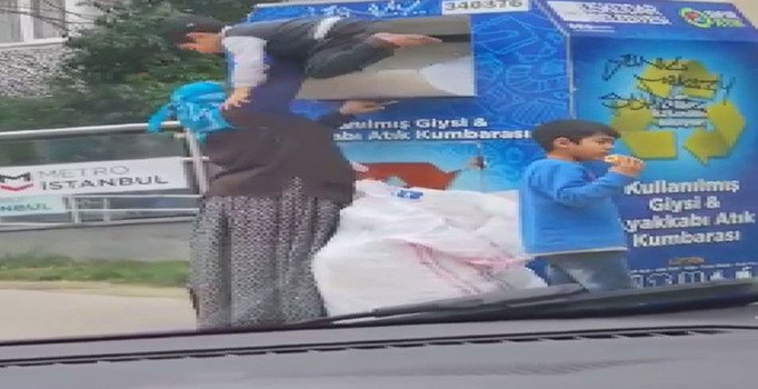 Üsküdar'da bir kadın çocuğunu giysi kumbarasına sokup hırsızlık yaptı