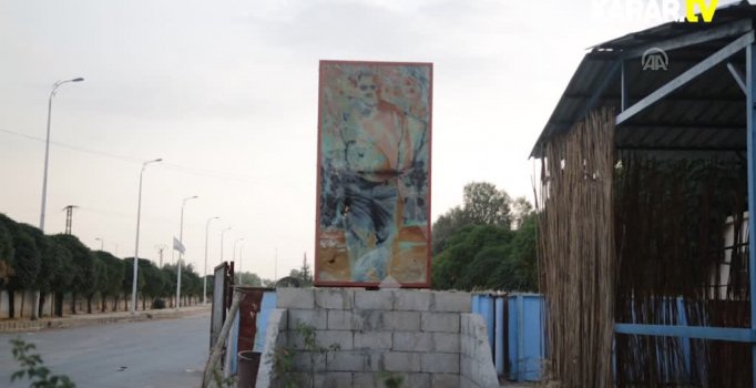 YPG, hastane yakıp Öcalan'ın posterini astı