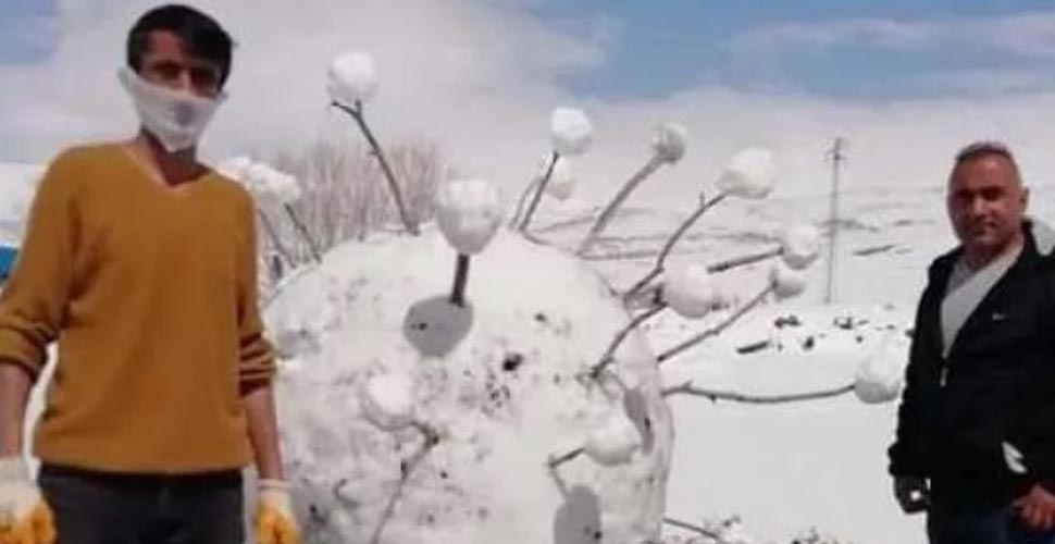 Ardahan'da kardan koronavirüs yaptılar, güneşe 2 saat dayandı