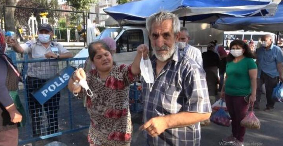 Pazara maskesiz gelince uyarılan kişiden ilginç cevap: Ben her gün hap yutuyorum