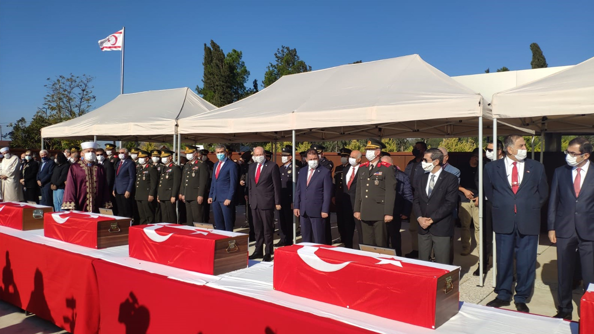 Kıbrıs'ta 46 yıl önce katledilen 14 çocuk toprağa verildi