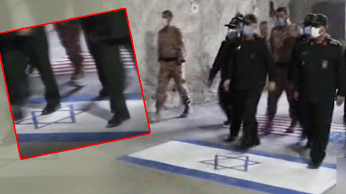 İran Devrim Muhafızı Komutanı ABD ve İsrail bayrağını çiğnedi