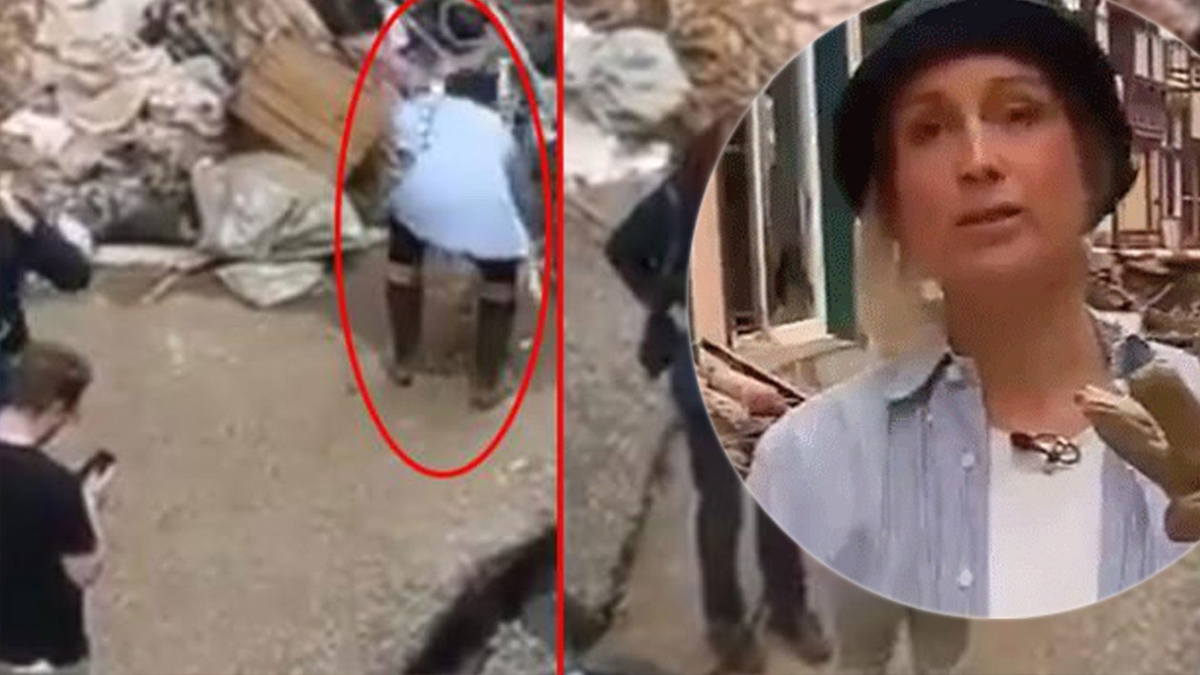 Almanya'da sel haberi yapan muhabir yüzüne çamur sürerken yakalandı