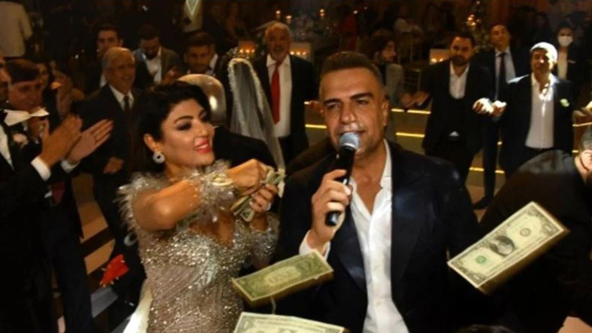 Sahnede başından aşağı dolarlar atılan Berdan Mardini'nin tepkisi şaşırttı