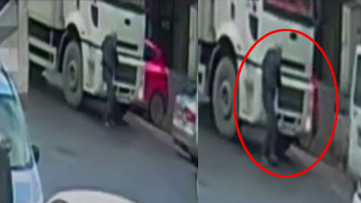 Freni boşalan kamyonu eliyle durdurmaya çalışan adam canından oluyordu