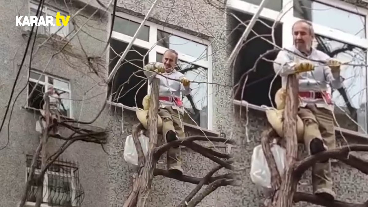 Kendini iple bağlayan adam evinin önündeki ağaçları budadı