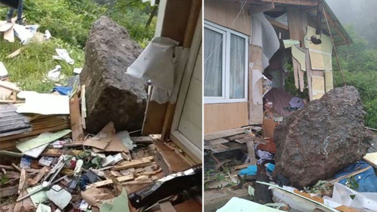 Artvin'de korkutan anlar: Yamaçtan kopan kaya evin duvarını yıktı