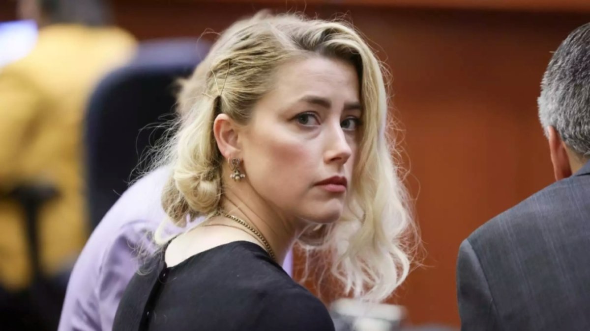 Amber Heard evini Johnny Depp'e olan borcu yüzünden mi sattı?