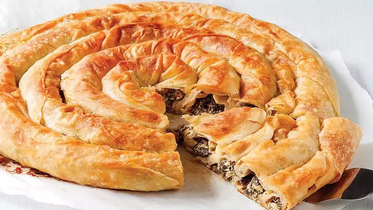 Oklava yok merdane yok, kahvaltı keyfinizi zirveye taşıyacak lezzet! Çayın yanında tel tel açılan börek tarifi