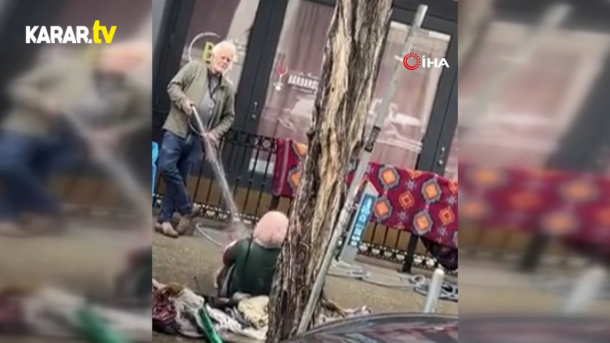 ABD'de evsiz kadını hortumla ıslatarak kovan şahıs kameralarda!