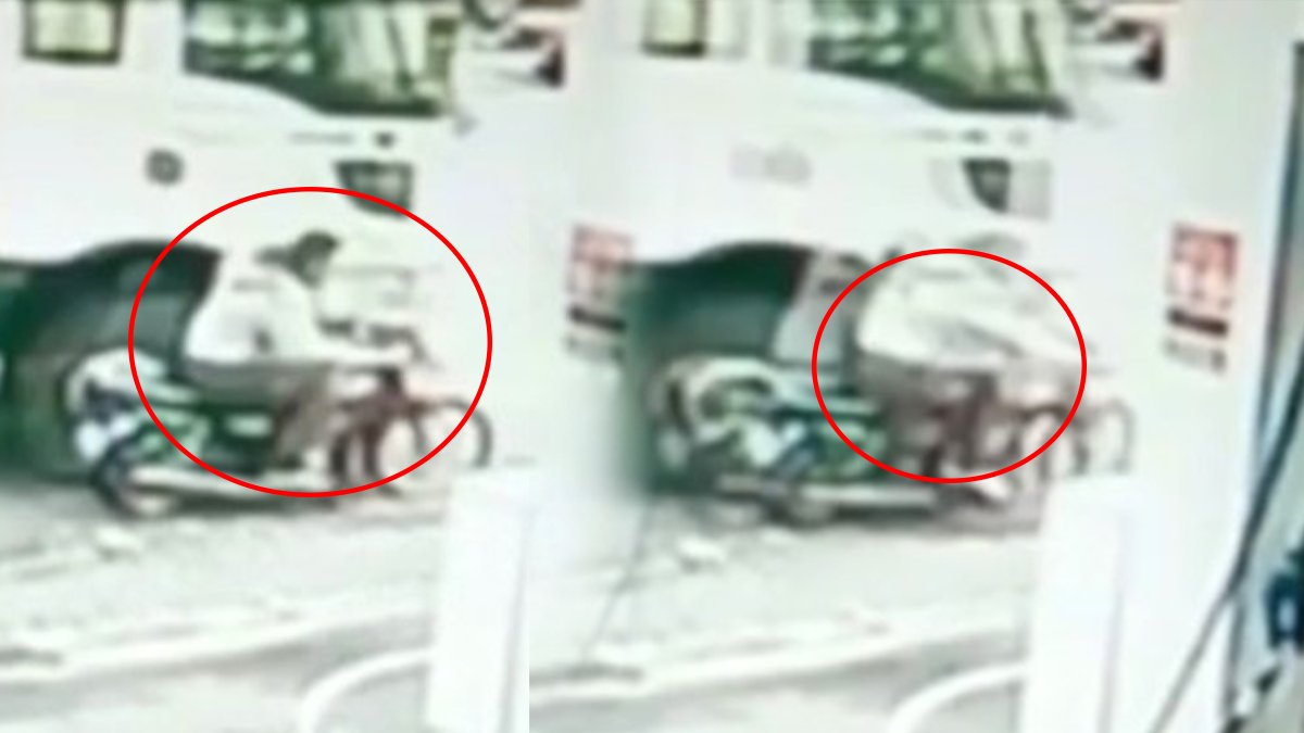 Kamyonun altında kalmaktan son anda kurtuldu! Motosiklet sürücüsü izleyenleri korkuttu...