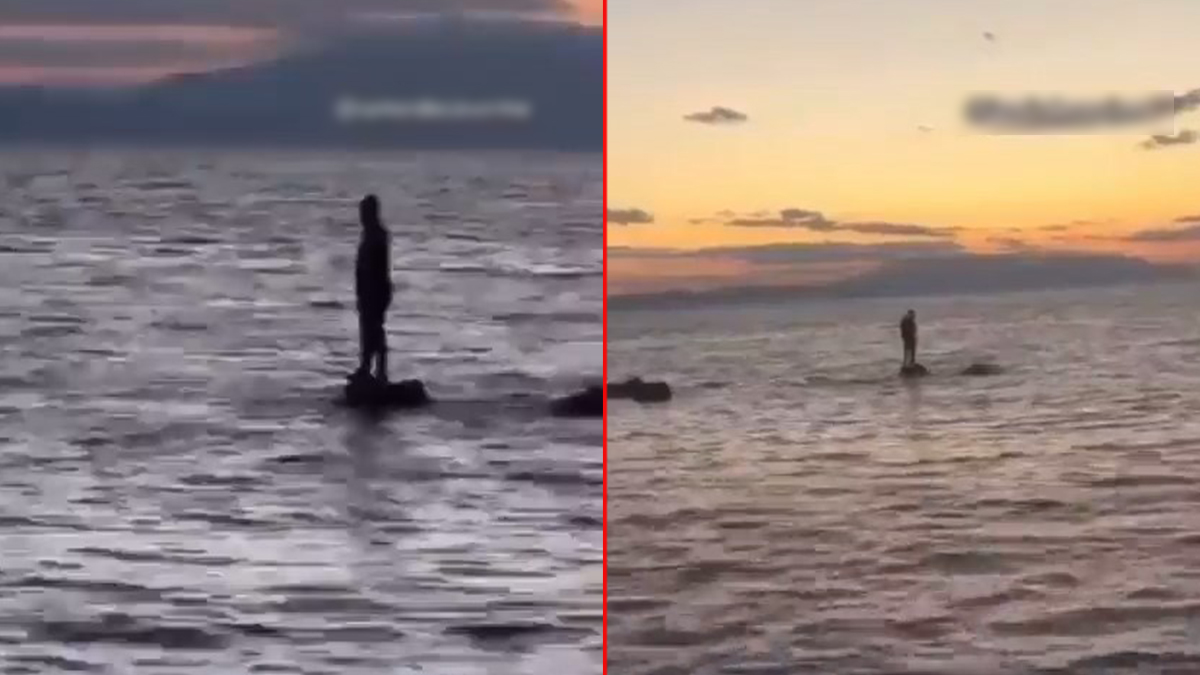 'Başka ülkede yaşayamam' dedirten görüntü! Batan teknenin üzerinde kurtarılmayı beklerken yaptığı herkesi şoke etti!