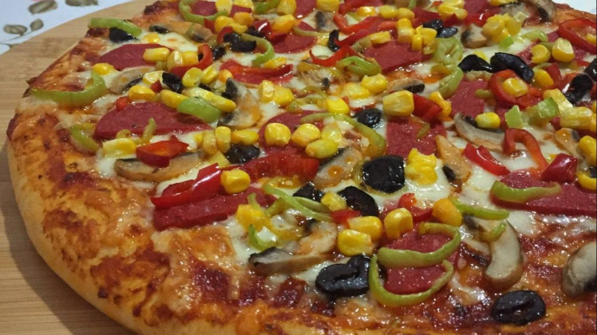 Pizza Tarifi: En Lezzetli Ev Yapımı Pizza Tarifi