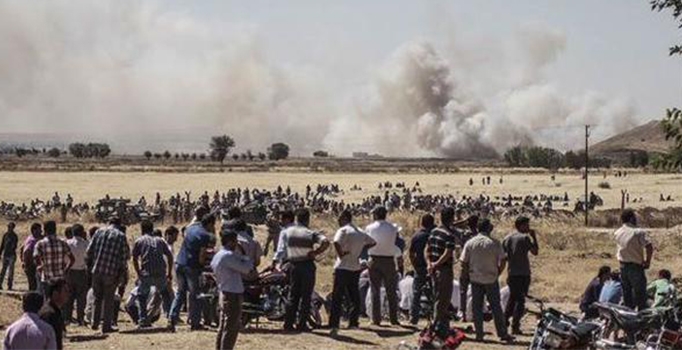 IŞİD Kobani'ye bombalı 
araçlarla saldırdı