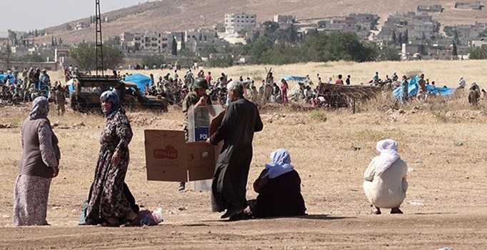 Kobani'den aralıklarla silah sesleri duyuluyor