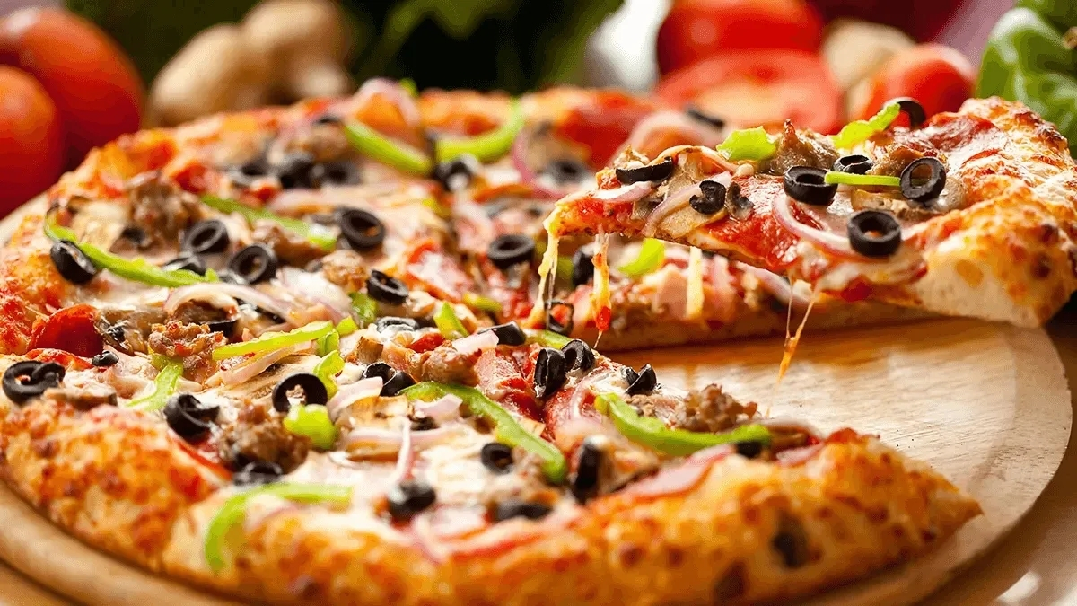 İtalyan lezzetini mutfağınıza taşıyın! Artık dışarıda pizzaya para vermeyeceksiniz: İşte evde kolay pizza yapımı