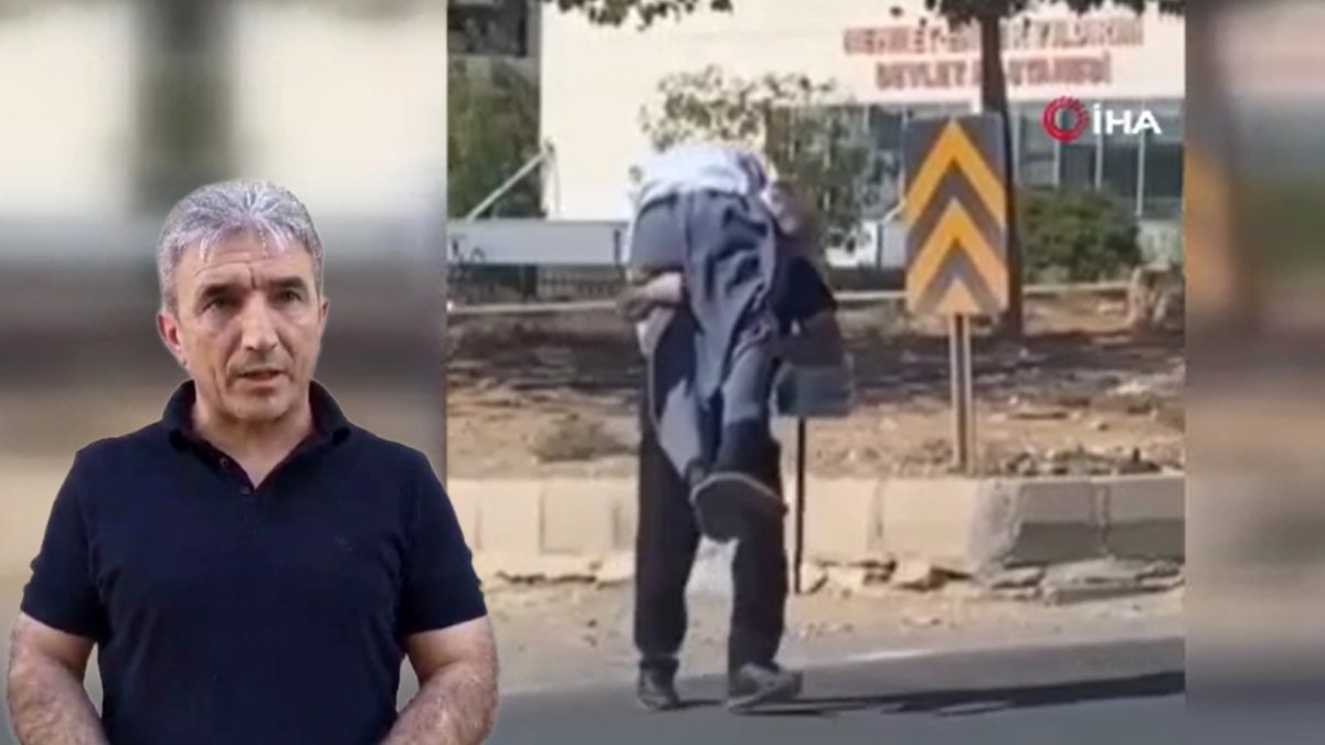 Hastane güvenliğinin yürek ısıtan hareketi! Yaşlı adamı sırtında yolun karşısına geçirdi
