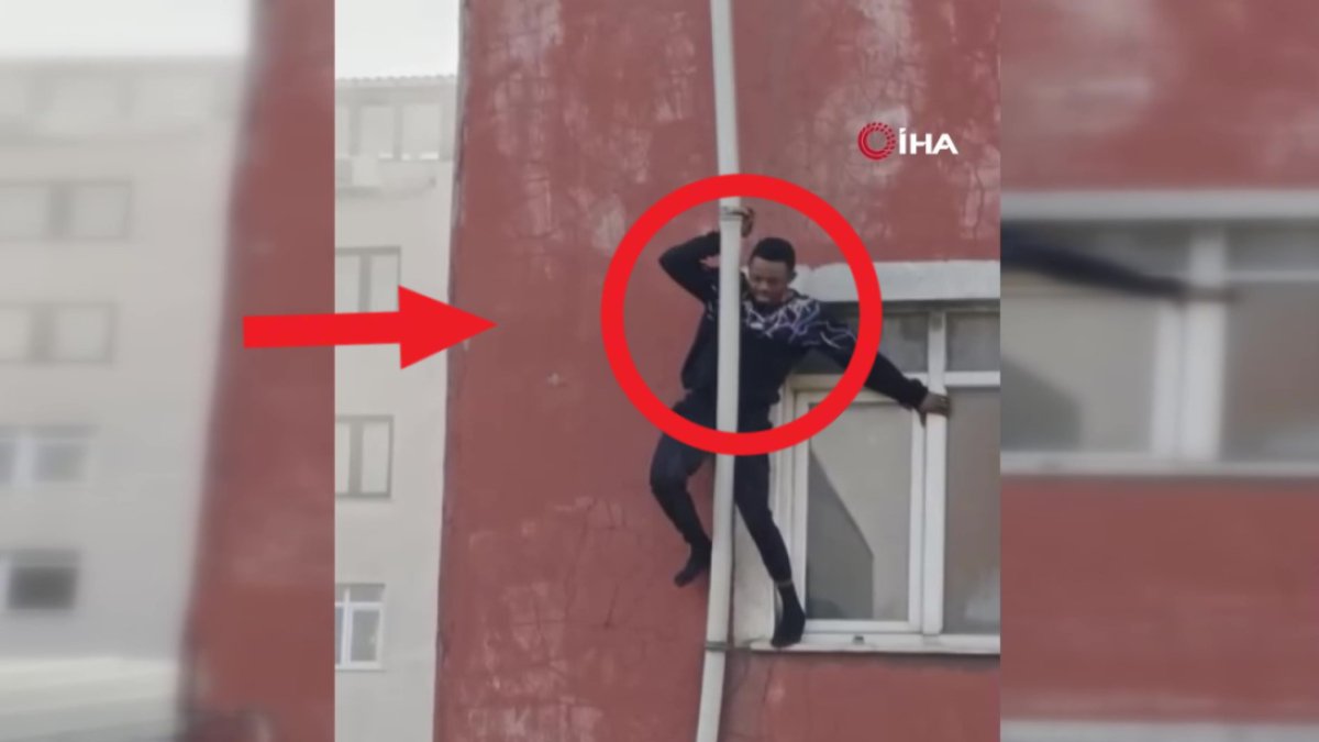 Yangında resmen can pazarı gözler önüne serildi! Boruya tutunan adamın düştüğü anlar kamerada