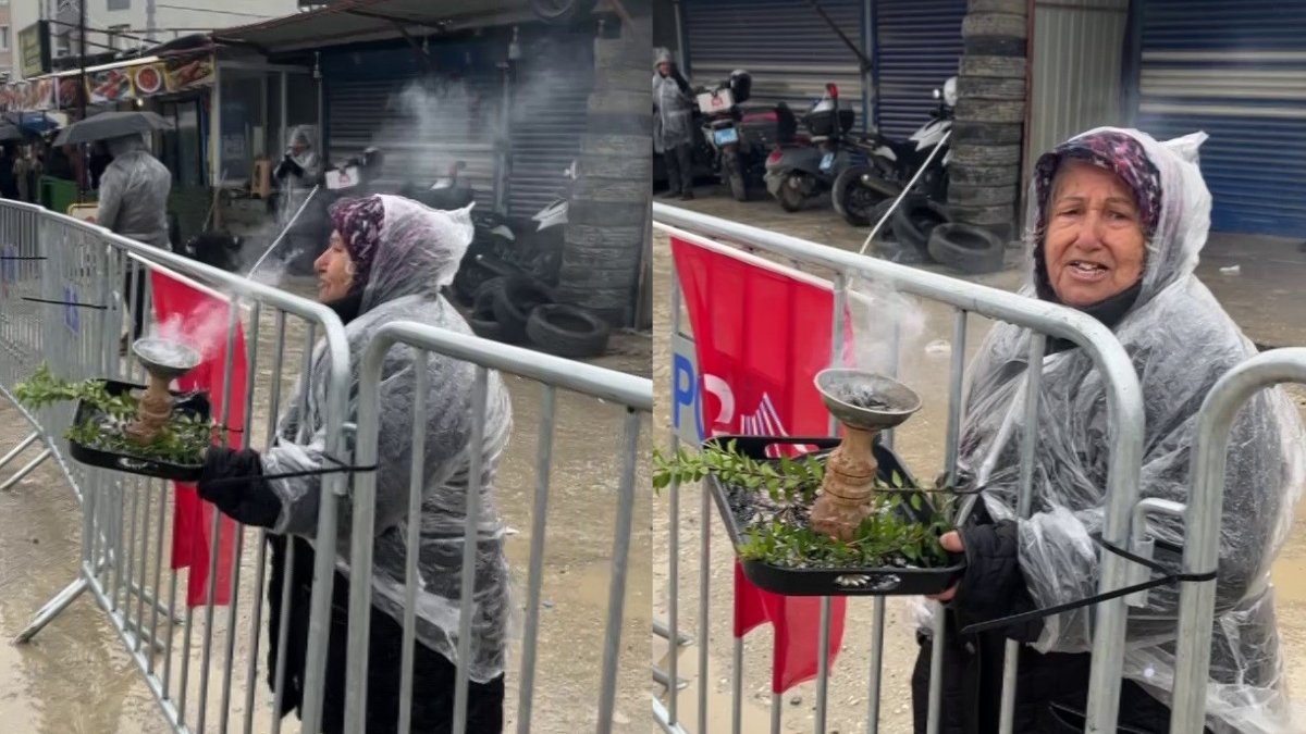 'Abla yanıyorsun' uyarılarına hiç aldırmadı! Özgür Özel mitinginde tütsü yakan kadın yanma tehlikesi geçirdi