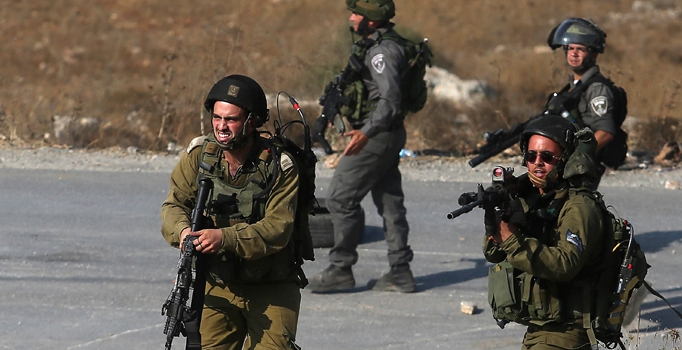 İsrail Batı Şeria ve Kudüs'te 21 Filistinliyi gözaltına aldı