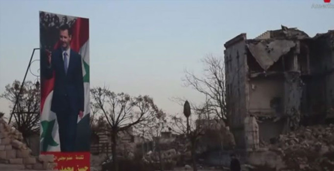 Yıkımını böyle taçlandırdı! Esed Halep'i posterleriyle donattı