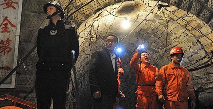 Çin'de madeni su bastı. 24 işçi mahsur kaldı