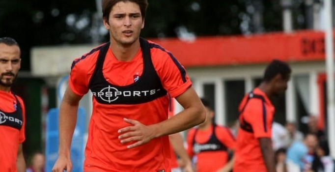 Trabzonsporlu futbolcu Okay Yokuşlu 4 hafta sahalardan uzak kalacak