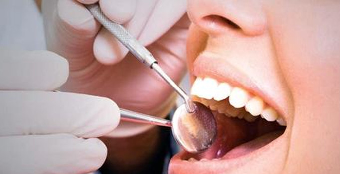 Gülerken diş etiniz görünüyorsa dikkat