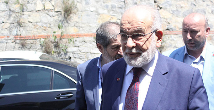 Karamollaoğlu'ndan Demirören ailesine taziye ziyareti