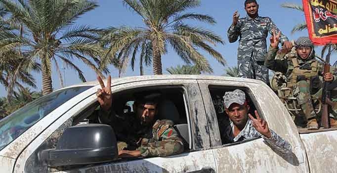 Irak'ta Şii milisler halka şiddet uyguluyor