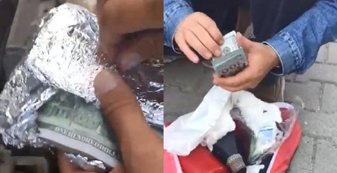 FETÖ şüphelisi, dolarları otomobilinin motor bölümüne saklamış