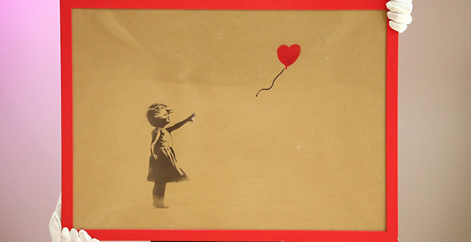 Banksy tablosunu kesti, milyonlar kaybetti