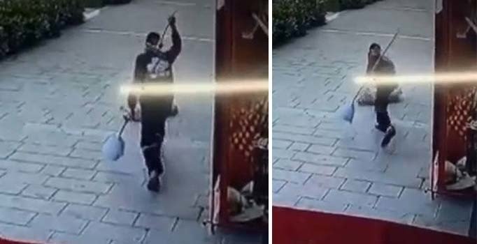 Uyuyan köpeğe süpürgesiyle acımasızca vurdu