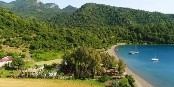 Ne Antalya ne de Çeşme! Ormanın içinden huzura çıkan saklı köy, yemyeşil doğası ve berrak denizi ile büyülüyor