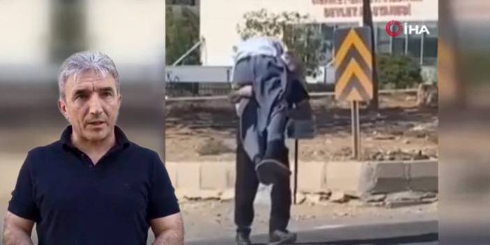 Hastane güvenliğinin yürek ısıtan hareketi! Yaşlı adamı sırtında yolun karşısına geçirdi