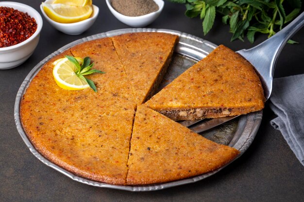 traditional-food-of-antakya-turkey-oruk-in-the-tray-turkish-name-tepside-icli-kofte-tepside-oruk-tepsi-orugu-sini-kofte-hatay-oruk-food-693630-4518.jpg