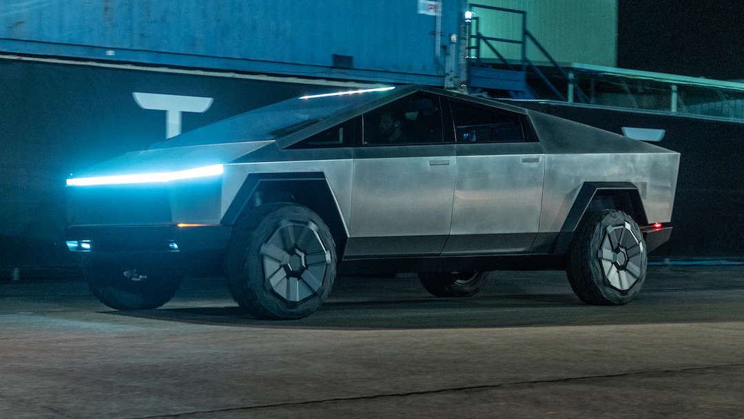tesla-cybertruck-electric-pickup-lights-on.webp