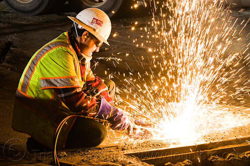 welder-cutting-rail-oxy-acetylene-torch.jpg