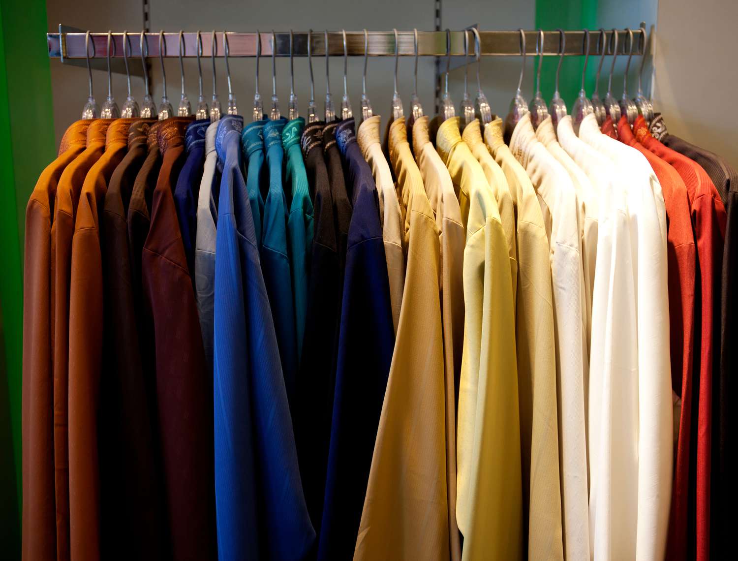close-up-of-clothes-hanging-in-row-739240657-5a78b11f8e1b6e003715c0ec.jpg