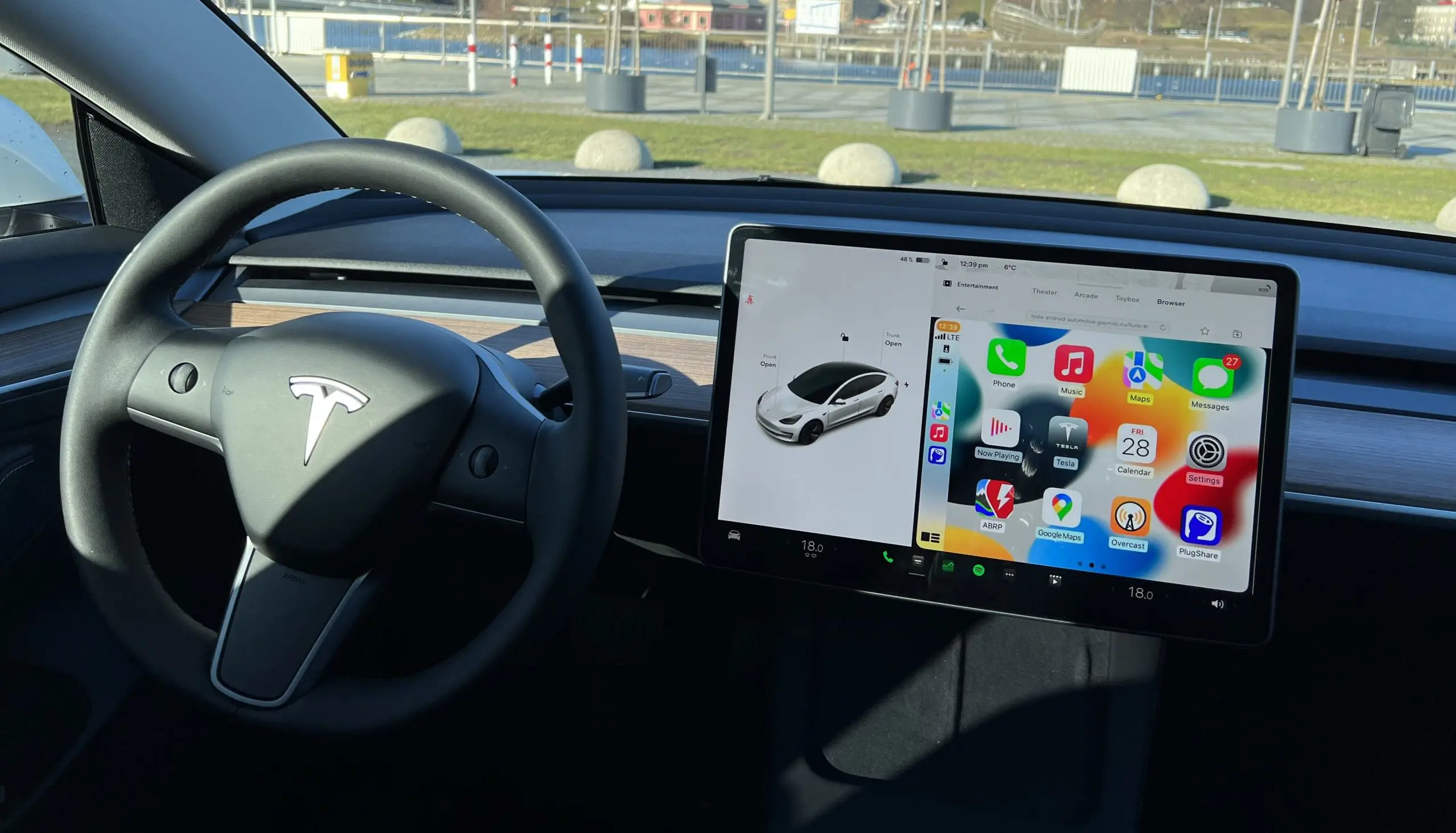 tesla-apple-carplay-hack-scaled-e1652125654962-jpg.webp