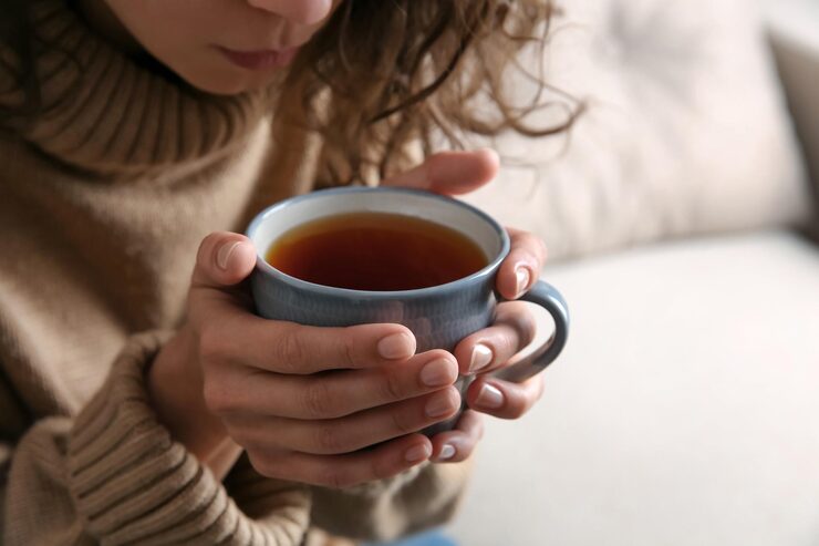 woman-with-cup-hot-tea-indoors-closeup-cozy-home-atmosphere-495423-40472.jpg